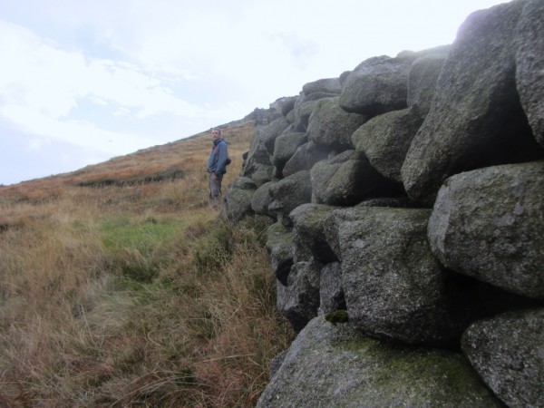 Now that you've crossed the Mourne Wall, follow the wall it bisected to your destination.
